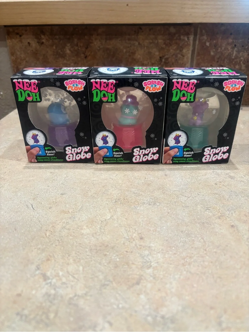 NeeDoh Advent Calendar with Candy Swirl Cubes and Snow Globes - Squishmas Bundle